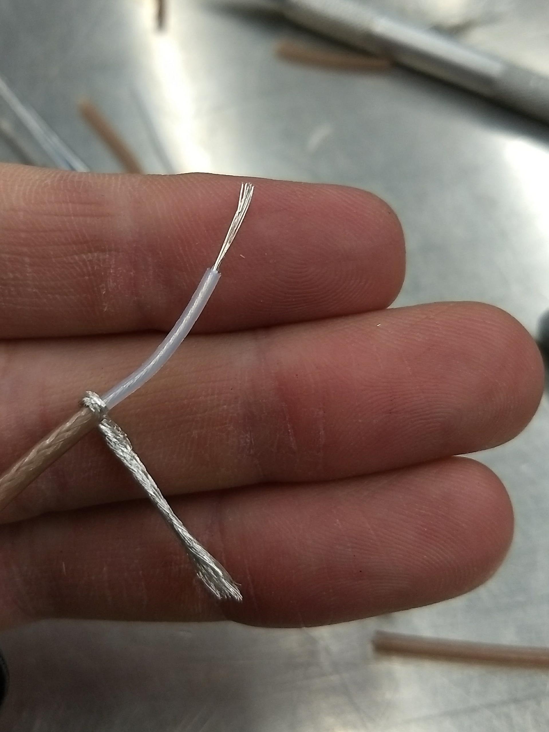 Modify one SMA coaxial cable to connect to the DCD and GND pins of the motherboard